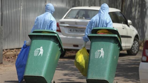 According to the Central Pollution Control Board (CPCB) guidelines, revised in June, the general waste contaminated by blood/body fluids of persons infected with Covid-19 shall be segregated in the yellow bag along with gloves and masks used by them.(AP file photo. Representative image) According to the Central Pollution Control Board (CPCB) guidelines, revised in June, the general waste contaminated by blood/body fluids of persons infected with Covid-19 shall be segregated in the yellow bag along with gloves and masks used by them.(AP file photo. Representative image)