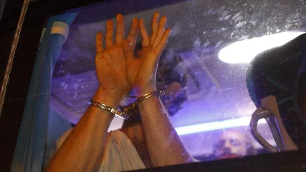 A protester detained by Israeli police on July 14. Netanyahu, on July 15, announced a plan to distribute hundreds of dollars in grants to every Israeli in order to stimulate the country’s sagging economy. However, Bloomberg reported quoting Israeli Democracy Institute’s survey that 75% of Israelis are dissatisfied with the government’s functioning during the crisis. (Menahem Kahana / AFP)