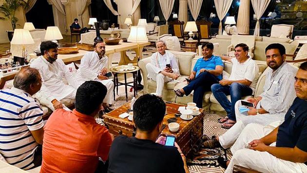 Rajasthan CM Ashok Gehlot along with newly appointed Rajasthan Congress chief Govind Singh Dotasra (4R) and Congress MLAs, in Jaipur on Wednesday.(ANI Photo) Rajasthan CM Ashok Gehlot along with newly appointed Rajasthan Congress chief Govind Singh Dotasra (4R) and Congress MLAs, in Jaipur on Wednesday.(ANI Photo)