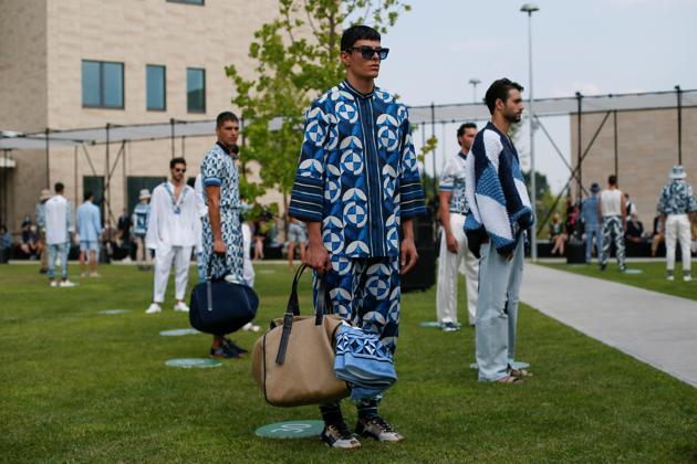 Models present creations from the Dolce & Gabbana Spring/Summer 2021 men's collection in a live-streamed show at the university campus of the Humanitas Research Foundation in one of the first physical fashion shows since the coronavirus disease (COVID-19) outbreak, during Milan Digital Fashion Week in Rozzano, south of Milan, Italy, July 15, 2020. (REUTERS)