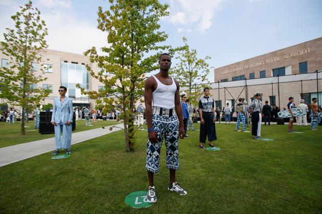 Models present creations from the Dolce & Gabbana Spring/Summer 2021 men's collection during Milan Digital Fashion Week in Rozzano, south of Milan, Italy, July 15, 2020. (REUTERS)