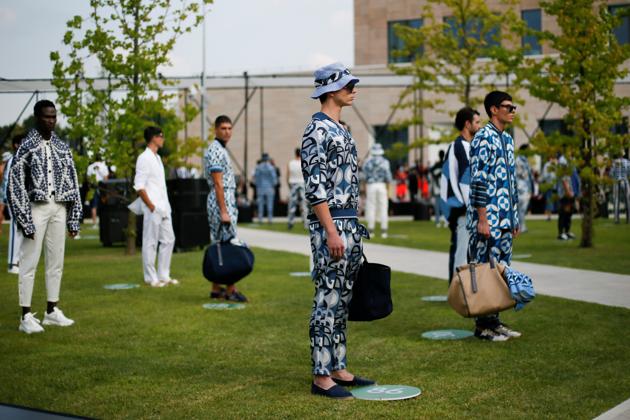 Models present creations from the Dolce & Gabbana Spring/Summer 2021 men's collection during Milan Digital Fashion Week in Rozzano, south of Milan, Italy, July 15, 2020. (REUTERS)