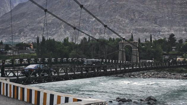 Vehicles cross a suspension bridge over the Indus river in Gilgit.(Representative image REUTERS)