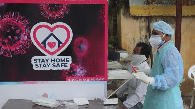 A man gets his nasal swab sample taken to test for the coronavirus at a government hospital in Hyderabad. (AP) A man gets his nasal swab sample taken to test for the coronavirus at a government hospital in Hyderabad. (AP)