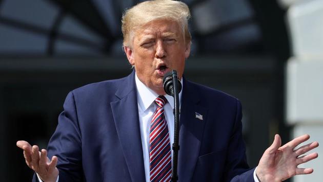 US President Donald Trump touts administration efforts to curb federal regulations during an event on the South Lawn of the White House in Washington, US on July 16, 2020. (Reuters Photo) US President Donald Trump touts administration efforts to curb federal regulations during an event on the South Lawn of the White House in Washington, US on July 16, 2020. (Reuters Photo)