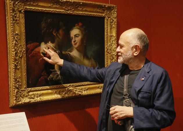 Ukrainian painter Oleksandr Roytburd views "An Amorous Couple" by 18th century French artist Pierre Louis Goudreaux in the Khanenko Family National Museum in Kyiv, Ukraine, Tuesday, July 14, 2020. The painting had been stolen by the Nazis from the Museum in Kyiv during WWII and then surfaced at Doyle Auctions in New York in 2013. The Khanenko Museum requested that Doyle's remove the work from its auction. (AP)