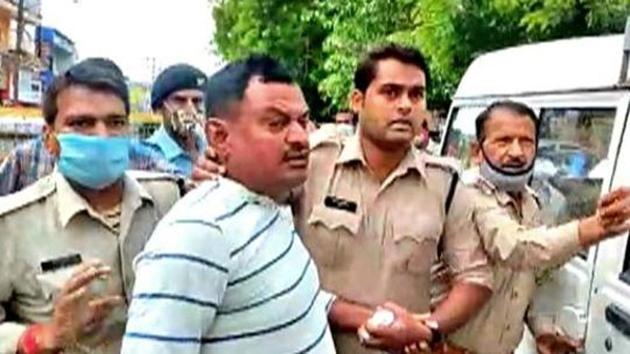 Gangster Vikas Dubey after being detained in Madhya Pradesh’s Ujjain on July 9.(ANI File Photo)