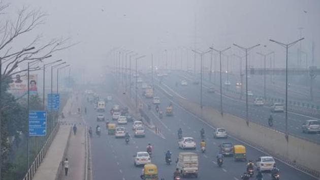 Vehicles ply amid an atmosphere shrouded in smog in New Delhi, becoming a serious health concern for the residents. (PTI photo) Vehicles ply amid an atmosphere shrouded in smog in New Delhi, becoming a serious health concern for the residents. (PTI photo)