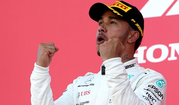 An ecstatic Lewis Hamilton celebrating a win. (Getty Images) An ecstatic Lewis Hamilton celebrating a win. (Getty Images)