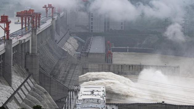 The dam was holding back about 45% of the water, Xinhua said, citing China Three Gorges Corp.(Zheng Jiayu/Xinhua via AP)