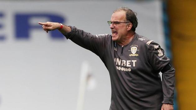FILE PHOTO: Soccer Football - Championship - Leeds United v Barnsley - Elland Road, Leeds, Britain - July 16, 2020 Leeds United manager Marcelo Bielsa, as play resumes behind closed doors following the outbreak of the coronavirus disease (COVID-19) Action Images/Lee Smith (Action Images) FILE PHOTO: Soccer Football - Championship - Leeds United v Barnsley - Elland Road, Leeds, Britain - July 16, 2020 Leeds United manager Marcelo Bielsa, as play resumes behind closed doors following the outbreak of the coronavirus disease (COVID-19) Action Images/Lee Smith (Action Images)