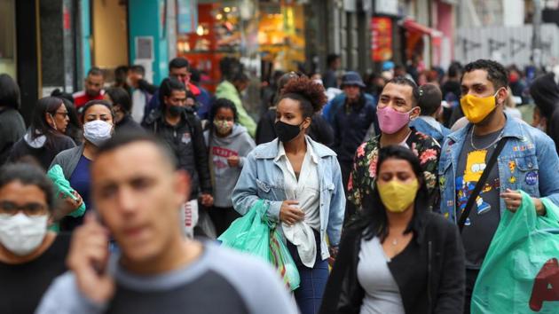 People walk at a popular shopping street amid the outbreak of the coronavirus disease (COVID-19) in Sao Paulo on July 15. Brazil is the second worst affected country in the world by the coronavirus after the United States. “Two million is a symbolic number because we don’t have wide scale testing,” infectious disease expert from the Albert Einstein hospital in Sao Paulo, Jean Gorinchteyn told AFP. (Amanda Perobelli / REUTERS)