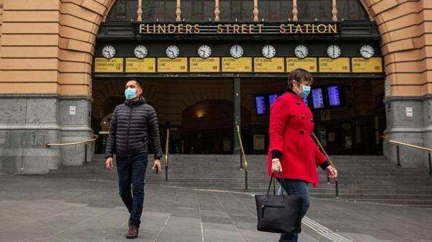 People seen outside Flinders Street Station amid a lockdown in Melbourne, Australia on July 17. The number of cases globally is around triple that of severe influenza illnesses recorded annually, according to the World Health Organization. (Daniel Pockett / REUTERS) People seen outside Flinders Street Station amid a lockdown in Melbourne, Australia on July 17. The number of cases globally is around triple that of severe influenza illnesses recorded annually, according to the World Health Organization. (Daniel Pockett / REUTERS)