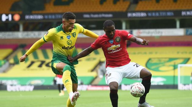 Soccer Football - FA Cup - Quarter Final - Norwich City v Manchester United - Carrow Road, Norwich, Britain - June 27, 2020 Manchester United's Odion Ighalo in action with Norwich City's Ben Godfrey.(REUTERS)