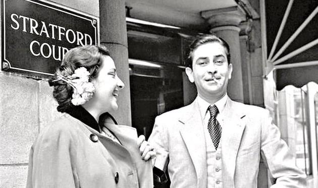 Raj Kapoor looks at the camera as Nargis stares at him fondly in this throwback image shared by Dharmendra. Raj Kapoor looks at the camera as Nargis stares at him fondly in this throwback image shared by Dharmendra.