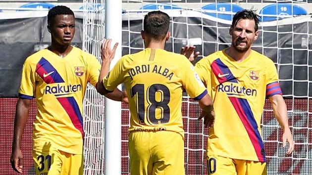 Barcelona’s Lionel Messi celebrates scoring their second goal with Jordi Alba and Ansu Fati. (Reuters) Barcelona’s Lionel Messi celebrates scoring their second goal with Jordi Alba and Ansu Fati. (Reuters)