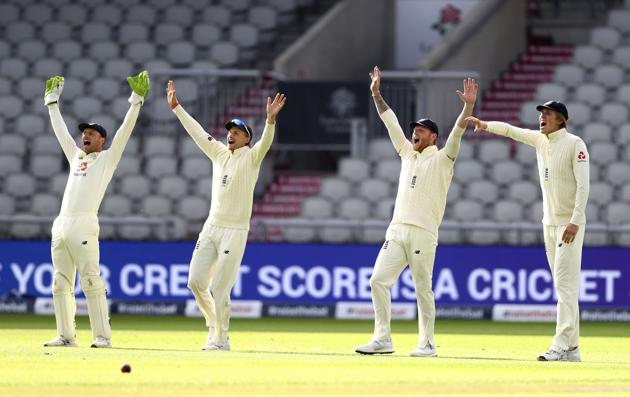 From left, England's Jos Buttler, Joe Root, Ben Stokes and Zak Crawley appeal for the wicket of West Indies' John Campbell during the second day of the second cricket Test match between England and West Indies at Old Trafford in Manchester, England, Friday, July 17, 2020. (Michael Steele/Pool via AP) (AP)