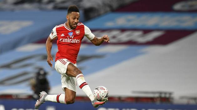Arsenal's Pierre-Emerick Aubameyang kicks at the ball during the FA Cup semifinal soccer match between Arsenal and Manchester City at Wembley in London, England, Saturday, July 18, 2020. (AP) Arsenal's Pierre-Emerick Aubameyang kicks at the ball during the FA Cup semifinal soccer match between Arsenal and Manchester City at Wembley in London, England, Saturday, July 18, 2020. (AP)