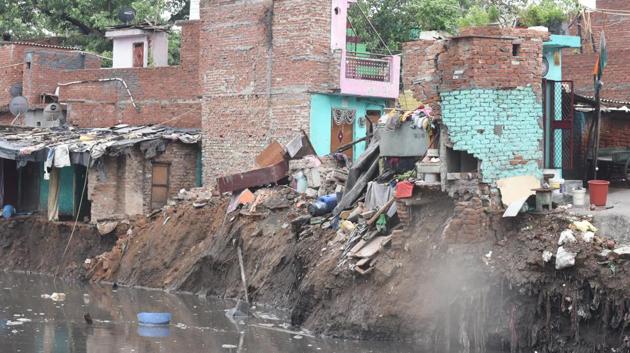 A view of an area in Anna Nagar where several houses collapsed due to heavy rain and were swept into a canal in New Delhi on July 19. The IMD has predicted thunderstorms with rain in the national capital and neighbouring areas till July 21. (Sonu Mehta / HT Photo)