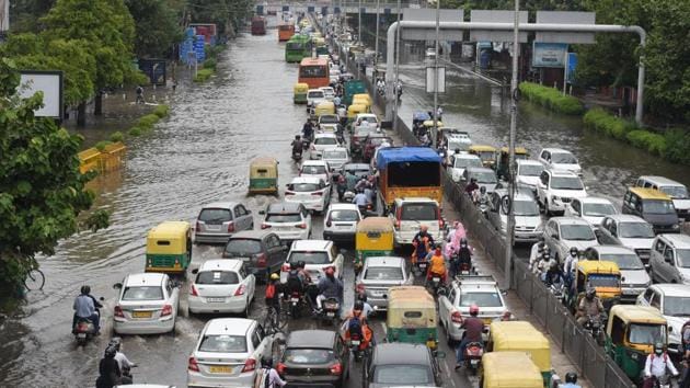 Photos: Heavy rains lash Delhi NCR, waterlogging and traffic add to ...