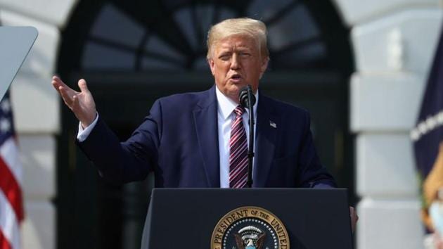 US President Donald Trump touts administration efforts to curb federal regulations during an event on the South Lawn of the White House in Washington, US.(Reuters File Photo)