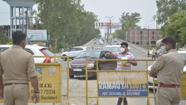 Police personnel manning barricades at Indergarhi in Ghaziabad on July 18. The focused efforts of the Centre, state and UT governments on efficient clinical management of hospitalised cases have ensured that India’s CFR has fallen below 2.5% for the first time since the Covid-19 pandemic began, the Union Health Ministry said on July 19. (Sakib Ali / HT Photo) Police personnel manning barricades at Indergarhi in Ghaziabad on July 18. The focused efforts of the Centre, state and UT governments on efficient clinical management of hospitalised cases have ensured that India’s CFR has fallen below 2.5% for the first time since the Covid-19 pandemic began, the Union Health Ministry said on July 19. (Sakib Ali / HT Photo)