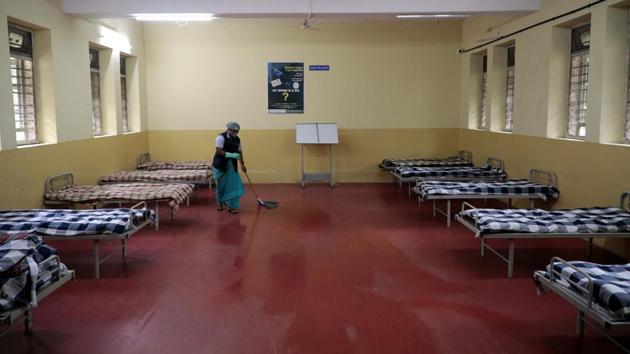 A Pune Municipal Corporation (PMC) worker cleans the premises of a temporary isolation ward in College of Agricultural hostel in Pune on July 18. There are 29 states and union territories in the country with a CFR lower than the national average, with five of them reporting a CFR of zero and 14 with a fatality rate of less than 1%, PTI reported. (Rahul Raut / HT Photo) A Pune Municipal Corporation (PMC) worker cleans the premises of a temporary isolation ward in College of Agricultural hostel in Pune on July 18. There are 29 states and union territories in the country with a CFR lower than the national average, with five of them reporting a CFR of zero and 14 with a fatality rate of less than 1%, PTI reported. (Rahul Raut / HT Photo)