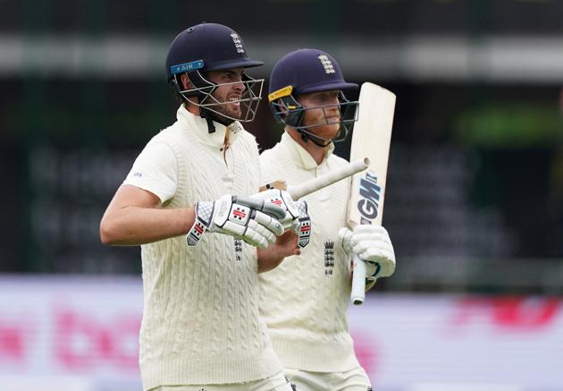 Cricket - Second Test - England v West Indies - Emirates Old Trafford, Manchester, Britain - July 16, 2020 England's Ben Stokes and Dom Sibley leave the pitch for tea, as play resumes behind closed doors following the outbreak of the coronavirus disease (COVID-19) Jon Super/Pool via REUTERS (REUTERS) Cricket - Second Test - England v West Indies - Emirates Old Trafford, Manchester, Britain - July 16, 2020 England's Ben Stokes and Dom Sibley leave the pitch for tea, as play resumes behind closed doors following the outbreak of the coronavirus disease (COVID-19) Jon Super/Pool via REUTERS (REUTERS)