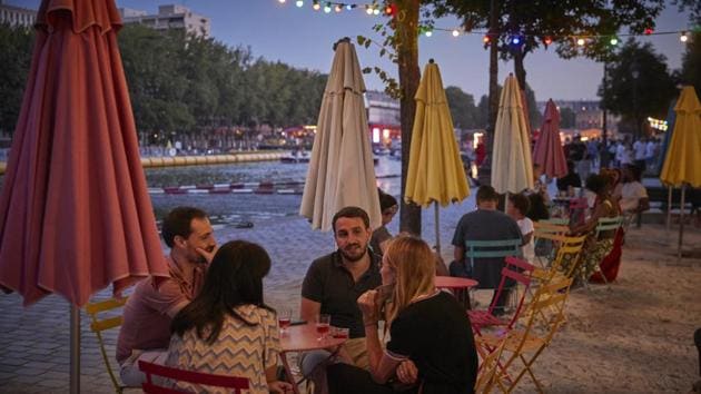 As well as sand and views of central Paris’ architecture, Paris Plage offers sporting opportunities such as fencing, giant table-football, and open-air gyms looking out over the Seine, although this year the tighter health restrictions have limited some of the activities. (Kiran Ridley / Getty Images) As well as sand and views of central Paris’ architecture, Paris Plage offers sporting opportunities such as fencing, giant table-football, and open-air gyms looking out over the Seine, although this year the tighter health restrictions have limited some of the activities. (Kiran Ridley / Getty Images)