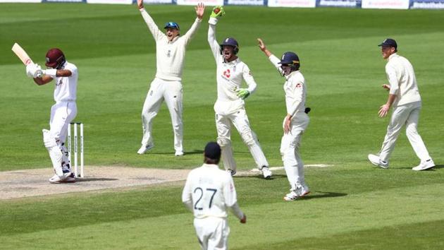 England's Jos Buttler and Joe Root appeal unsuccessfully for the wicket of West Indies' Shai Hope. (REUTERS)