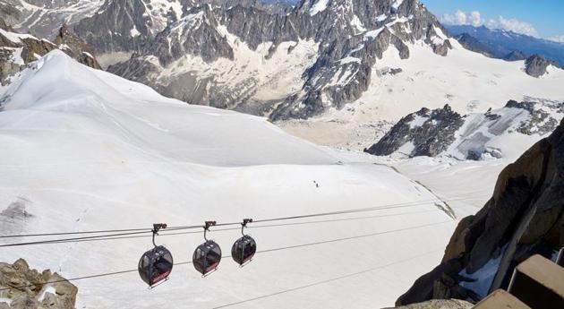 Gondolas of the Panoramic cable car to Italy are pictured at the Aiguille du Midi near the Mont-Blanc in Chamonix, France, July 20, 2020. (REUTERS)
