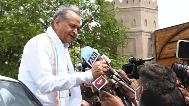 Rajasthan Chief Minister Ashok Gehlot speaks to media persons outside Hotel Fairmont while on his way to the CM Residence, in Jaipur, Rajasthan. (HT Photo) Rajasthan Chief Minister Ashok Gehlot speaks to media persons outside Hotel Fairmont while on his way to the CM Residence, in Jaipur, Rajasthan. (HT Photo)