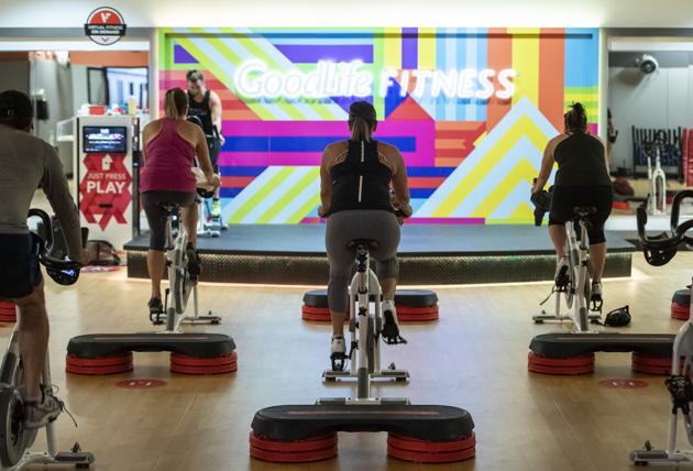 Members participate in a spin class at a GoodLife Fitness Centers Inc. gym on its first day of reopening in Ottawa, Ontario, Canada, on Friday, July 17, 2020. (Bloomberg)