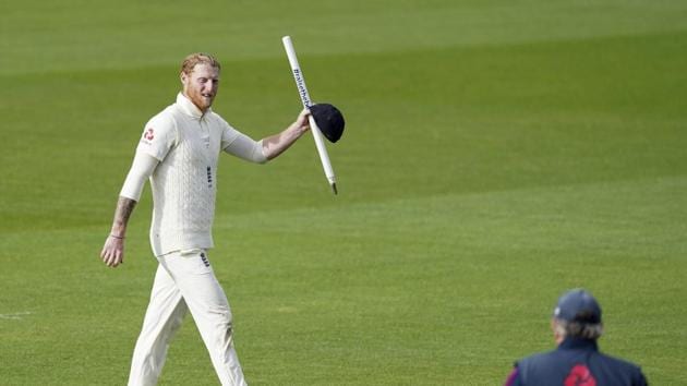 England's Ben Stokes walks off the field carrying a stump.(AP)