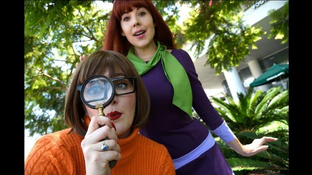 Melinda Gross (L) and Kit Quinn, dressed as Velma and Daphne from “Scooby Doo” on day one of Comic-Con International in San Diego on July 20, 2017. (Chris Pizzello/Invision/AP)