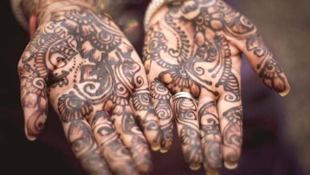 Mehndi application adds to the beauty of Teej festivities when friends and families get together to celebrate.(Unsplash)