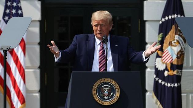 US President Donald Trump touts administration efforts to curb federal regulations during an event on the South Lawn of the White House in Washington, US. (Reuters) US President Donald Trump touts administration efforts to curb federal regulations during an event on the South Lawn of the White House in Washington, US. (Reuters)