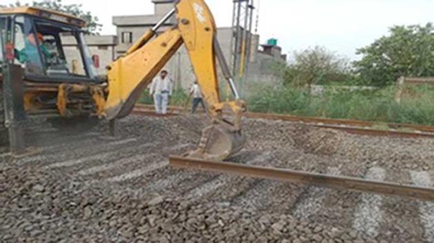 Upgrade of the railway track to Delhi underway in Ludhiana on Wednesday.(HT PHOTO)