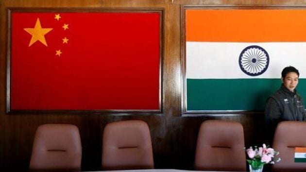 File photo: A man walks inside a conference room used for meetings between military commanders of China and India.(REUTERS)