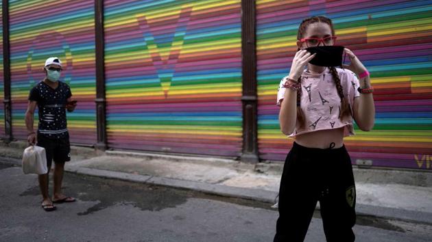 Thaidelen Gonzalez poses during a photo session for her quinceanera (coming of age of 15-year-olds) celebration amid coronavirus disease. (REUTERS/Alexandre Meneghini)