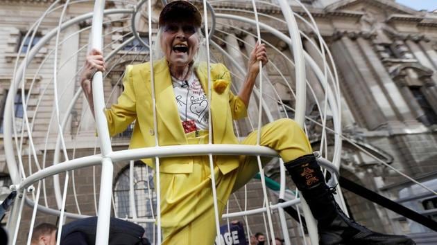 Vivienne Westwood stands inside a cage as she demonstrates outside the Old Bailey in support of Julian Assange. (REUTERS/Peter Nicholls) Vivienne Westwood stands inside a cage as she demonstrates outside the Old Bailey in support of Julian Assange. (REUTERS/Peter Nicholls)