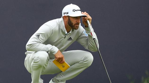 Dustin Johnson of the United States lines up a putt on the 18th green during the second round of the 148th Open Championship held on the Dunluce Links at Royal Portrush Golf Club.(Getty Images)