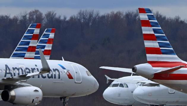 Customers who refuse to comply with the company’s policy may be barred from future travel for the duration of the face covering requirement, the airline added. (AP file photo) Customers who refuse to comply with the company’s policy may be barred from future travel for the duration of the face covering requirement, the airline added. (AP file photo)