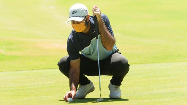 Professional golfer Shubhankar Sharma during practice at Chandigarh Golf Club that has opened following relaxations in lockdown in Chandigarh.(Hindustan Times)