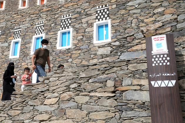 Tourists visit the cultural village of Rijal Almaa in the outskirts of Abha, Saudi Arabia July 17, 2020. (REUTERS) Tourists visit the cultural village of Rijal Almaa in the outskirts of Abha, Saudi Arabia July 17, 2020. (REUTERS)