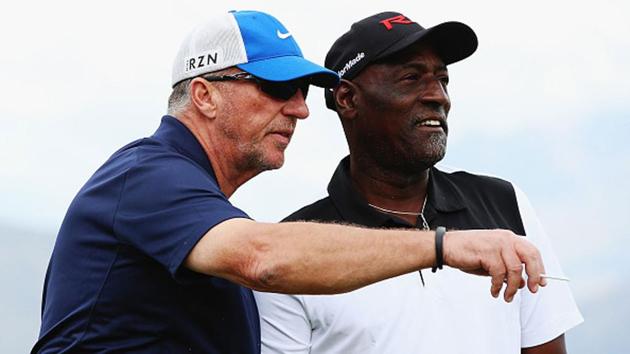 Ian Botham and Viv Richards together on a golf course.(Getty Images)