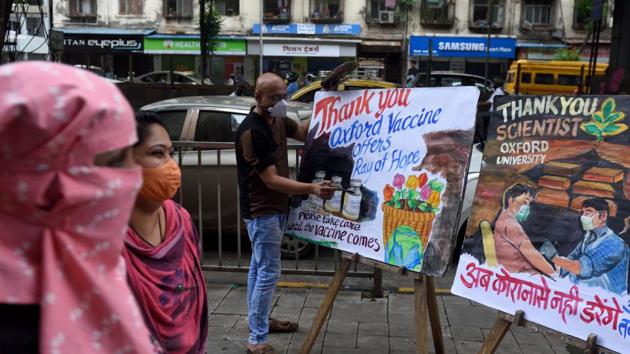A member of Gurukul School of Art makes artwork lauding Oxford University’s efforts towards a Covid-19 vaccine, in Mumbai on July 21. Since stepping out of hard lockdown, Maharashtra has provided relaxations for outdoor physical activities from June 3. Market areas, shops except for malls and shopping centres were opened from June 5. Private offices were allowed to open with up to 10% of staff from June 8. (Satish Bate / HT Photo)