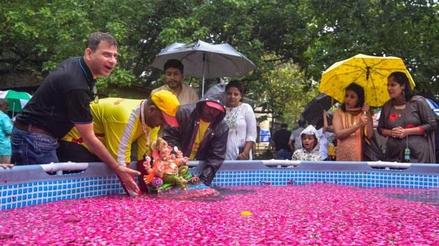 People immerse an idol in an artificial pond in 2019. (HT FILE PHOTO) People immerse an idol in an artificial pond in 2019. (HT FILE PHOTO)