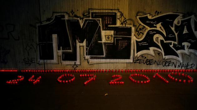 Lit candles are arranged at the "Night of Lights" event to commemorate the victims of a deadly stampede during the 2010 Love Parade festival, at the former festival site on the eve of the disaster's 10th anniversary, in Duisburg, Germany, July 23, 2020. (REUTERS) Lit candles are arranged at the "Night of Lights" event to commemorate the victims of a deadly stampede during the 2010 Love Parade festival, at the former festival site on the eve of the disaster's 10th anniversary, in Duisburg, Germany, July 23, 2020. (REUTERS)