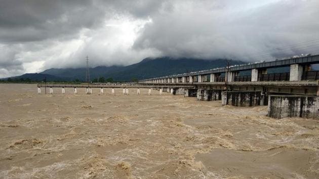A view of the flooded Valmikinagar barrage on River Gandak on July 22. River Gandak has turned turbulent following incessant downpour in the catchment area of Nepal and two districts of East and West Champaran, coupled with heavy discharge of water into the river from Valmikinagar barrage, HT reported. (ANI) A view of the flooded Valmikinagar barrage on River Gandak on July 22. River Gandak has turned turbulent following incessant downpour in the catchment area of Nepal and two districts of East and West Champaran, coupled with heavy discharge of water into the river from Valmikinagar barrage, HT reported. (ANI)